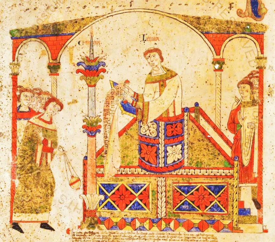 Die Buchillustration zeigt einen Kleriker, der auf einem erhöhten Ambo stehend das Exsultet vorsingt.