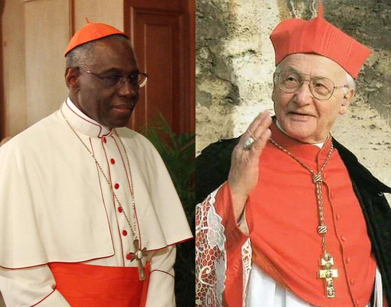 Halbporträts der beiden Kardinäle. Der dunkelhäutige Afrikaner Sarah in weißer Kardinalsrobe, Kardinal Stickler in großer roter Robe mit Schleppe